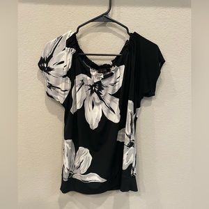 The Limited short sleeve top. Size large. Black with flower print. EUC.